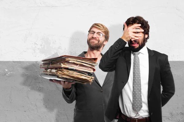 Scared businessman and businessman with documents — Stock Photo, Image