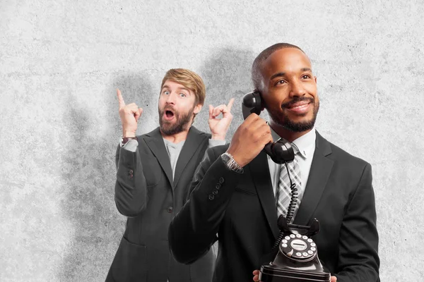 Young cool black man speaking at telephone — Stock Photo, Image