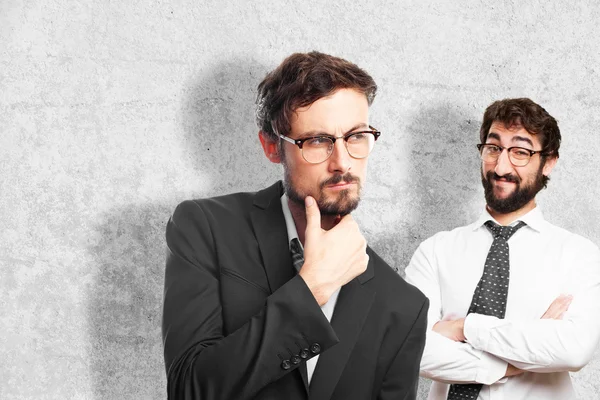 Young crazy businessman thinking — Stock Photo, Image