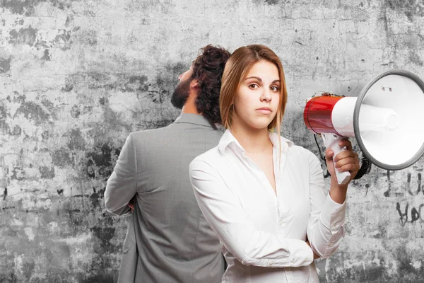 Blond woman with a megaphone — Stock Photo, Image