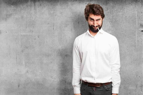 Angry man smoking — Stock Photo, Image