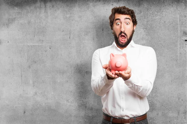 Man with a piggy bank — Stock Photo, Image