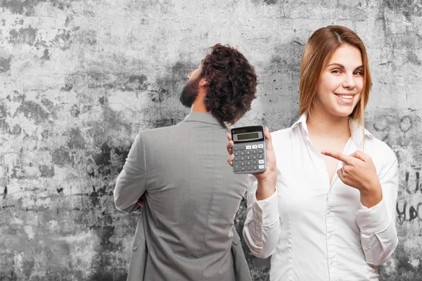 Blond woman with calculator — Stock Photo, Image