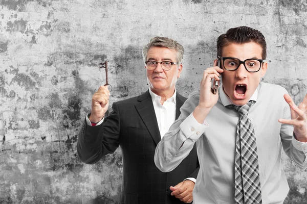 Angry businessman on phone — Stock Photo, Image