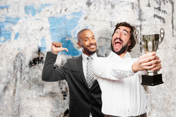 Man met een kampioen kopje — Stockfoto