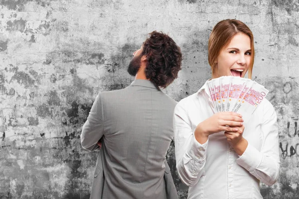 Blond woman with money — Stock Photo, Image