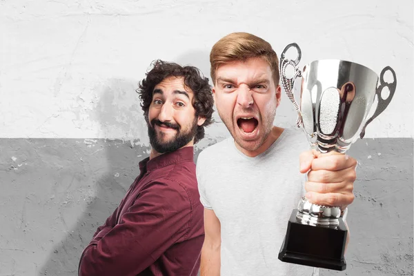 Blond winner man with a cup — Stock Photo, Image