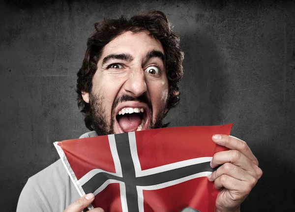 Crazy man with flag — Stock Photo, Image