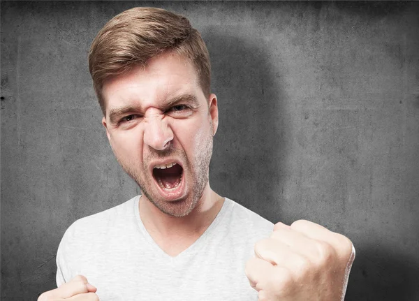 Blond man celebrating gesture — Stock Photo, Image