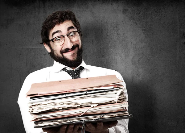 Homem de negócios tolo com arquivos — Fotografia de Stock