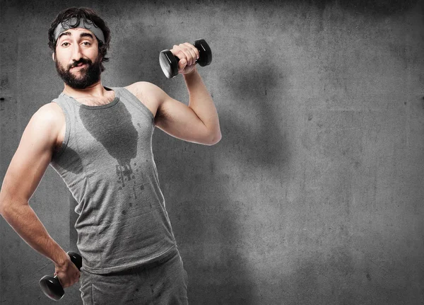 Sportsman with dumbbells — Stock Photo, Image