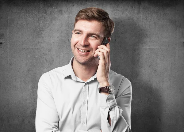 Blond man speaking on phone — Stock Photo, Image