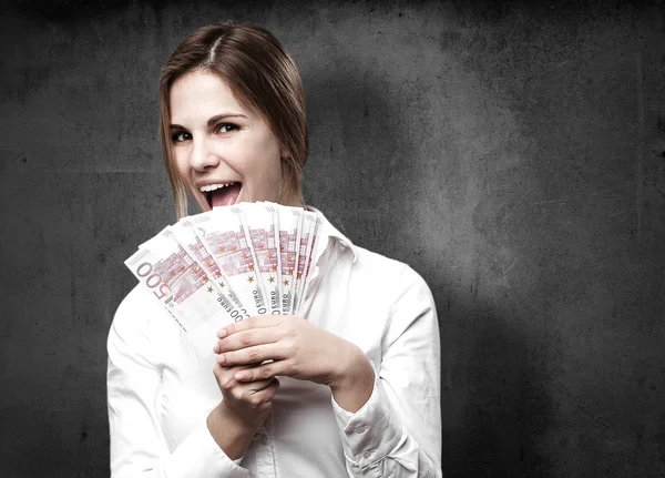 Blond woman with money — Stock Photo, Image