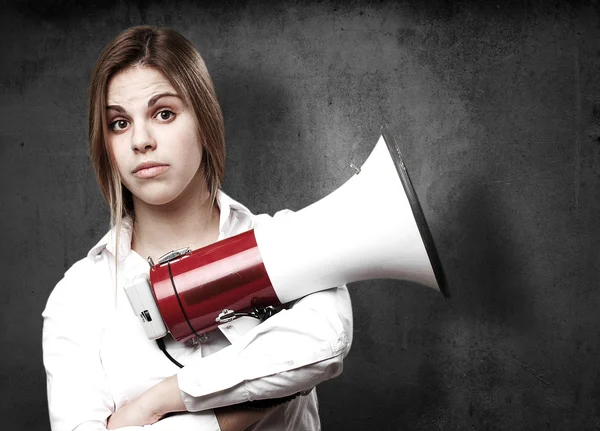 Blond woman with a megaphone — Stock Photo, Image