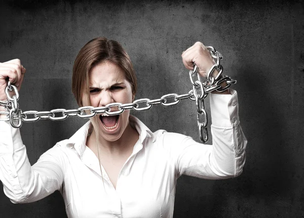 Blond woman with chains — Stock Photo, Image