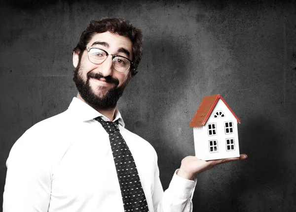 Businessman with a house — Stock Photo, Image