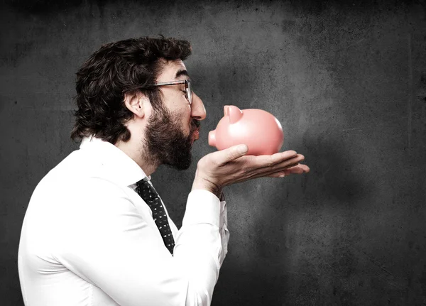 Businessman with piggy bank — Stock Photo, Image