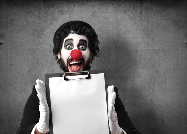 Clown with a banner — Stock Photo, Image