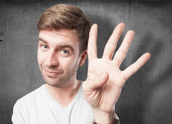 Blond man hand nummer — Stockfoto