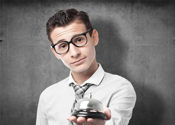 Businessman with a bell — Stock Photo, Image