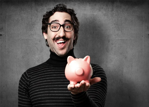 Pedant man met een piggy bank — Stockfoto