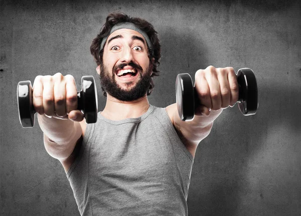 Sportman with dumbbells — Stock Photo, Image