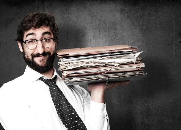 Homem de negócios tolo com arquivos — Fotografia de Stock