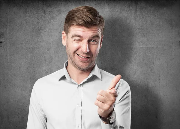 Blond man wijzen — Stockfoto