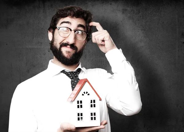 Homem de negócios com uma casa — Fotografia de Stock