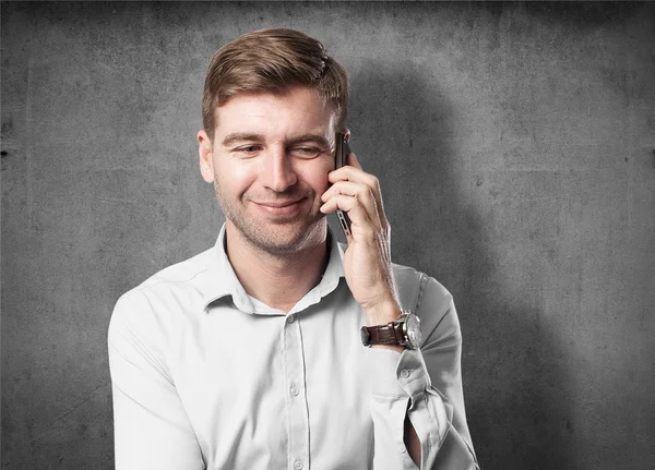 Blond man speaking on phone — Stock Photo, Image