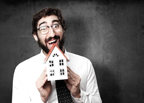 Homem de negócios com uma casa — Fotografia de Stock