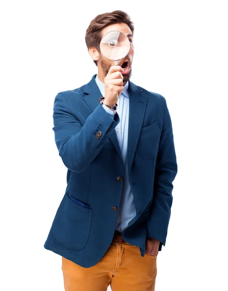 Businessman looking for with magnifying glass — Stock Photo, Image