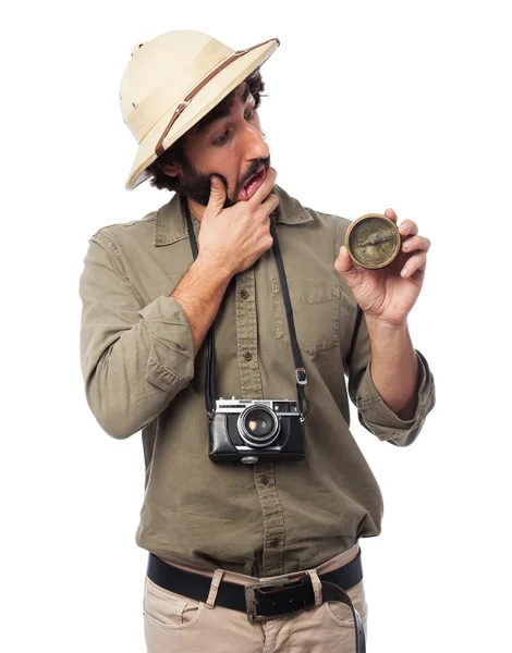 Preocupado explorador homem com bússola — Fotografia de Stock