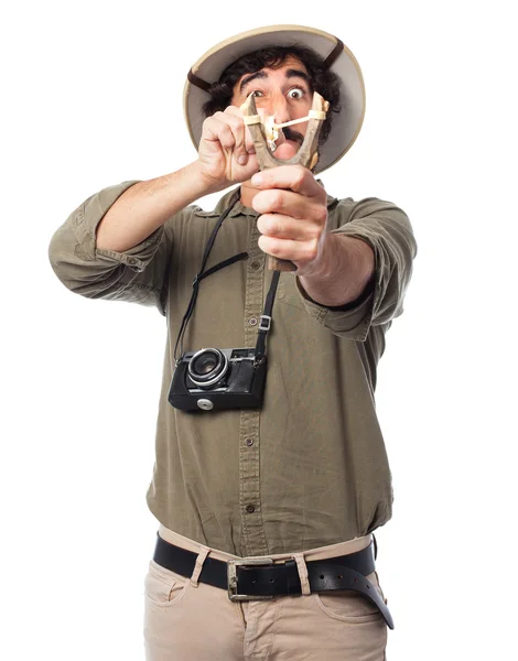 Crazy explorer man with slingshot — Stock Photo, Image