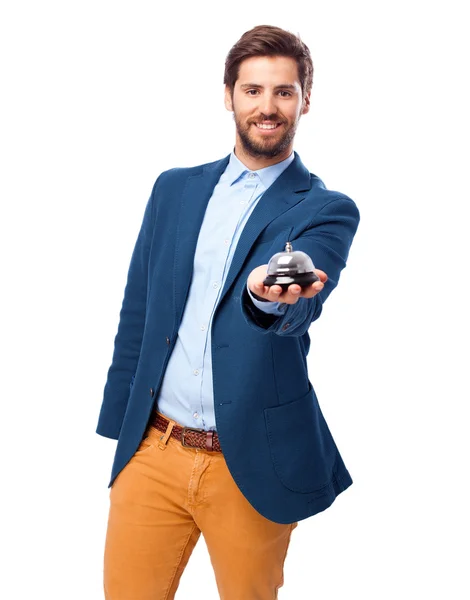 Happy businessman with ring bell — Stock Photo, Image