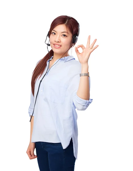 Chinese woman allright sign with telephone — Stock Photo, Image