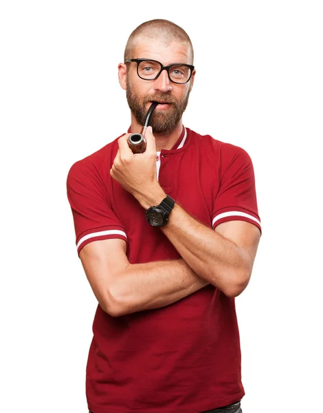 Young man with a pipe — Stock Photo, Image