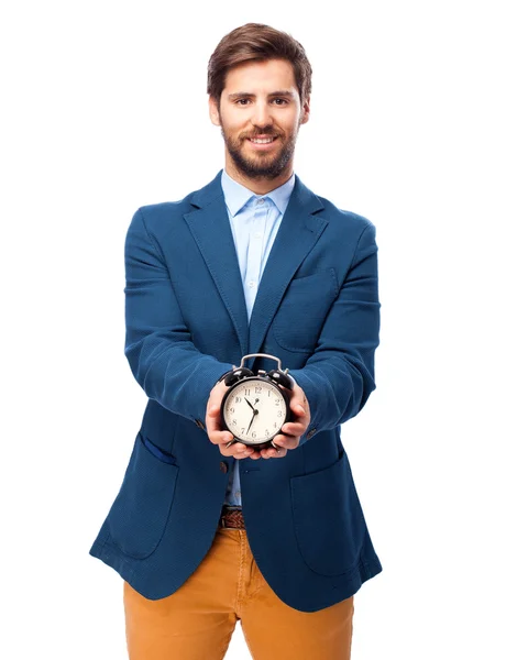 Happy businessman with clock — Stock Photo, Image