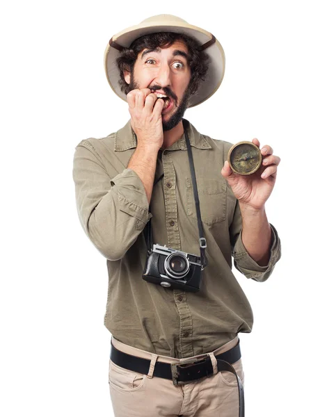 Worried explorer man with compass — Stock Photo, Image