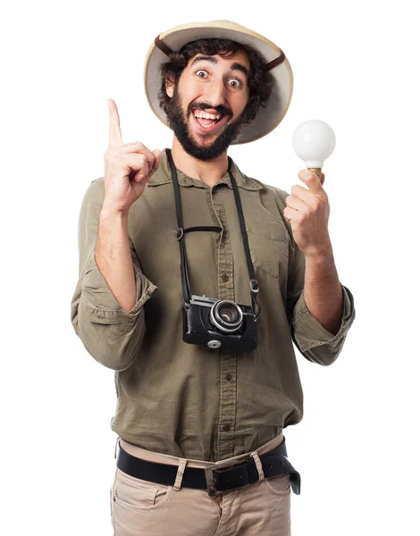 Crazy explorer man with light bulb — Stock Photo, Image