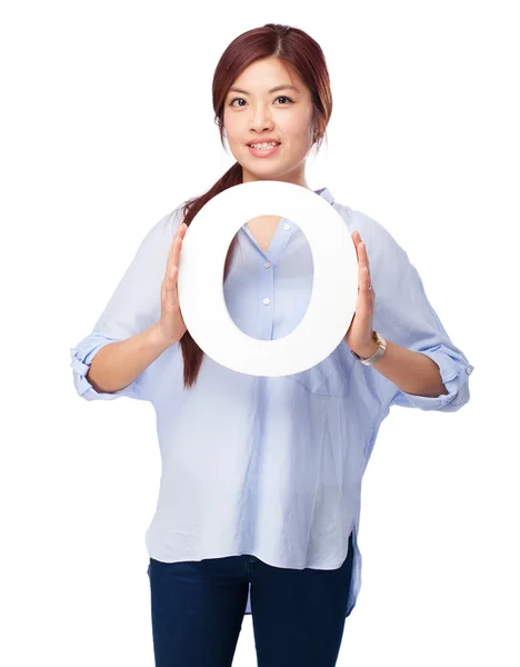 Happy chinese woman with o letter — Stock Photo, Image