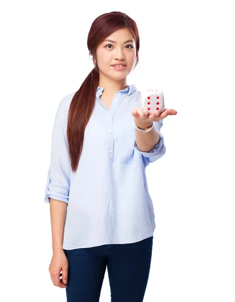 Chinese woman celebrating gesture with dice — Stock Photo, Image