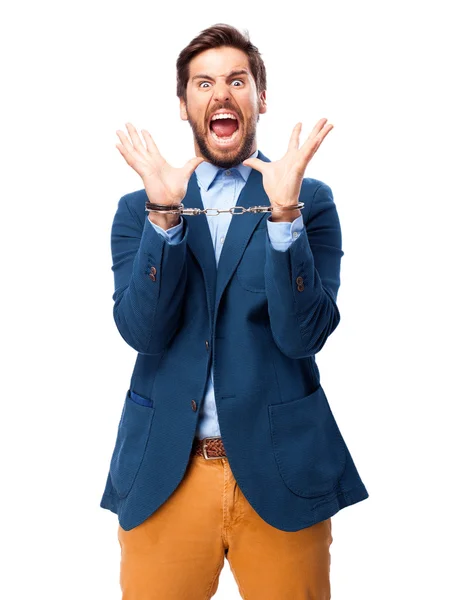 Happy businessman with handcuffs — Stock Photo, Image