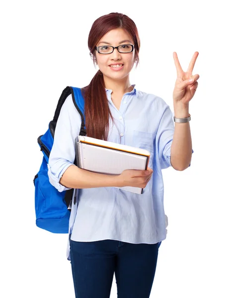 Chinese woman victory sign with notebook — Stock Photo, Image