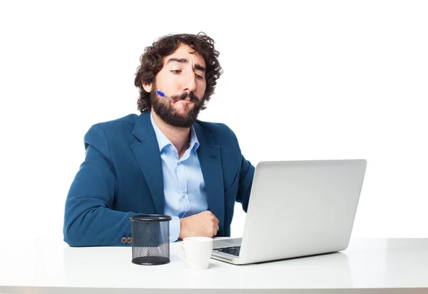 Homem de negócios confuso com laptop — Fotografia de Stock