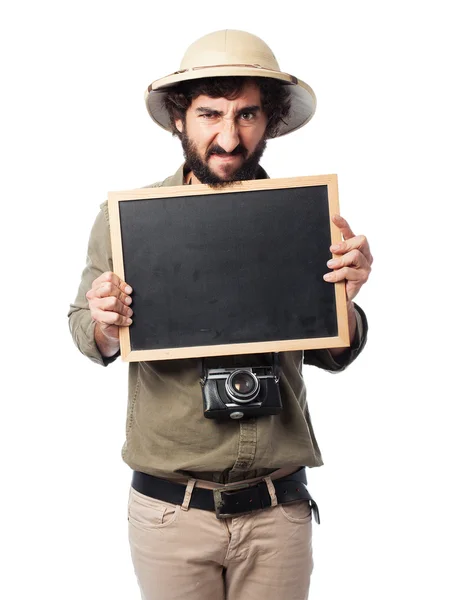 Crazy explorer man with blackboard — Stock Photo, Image