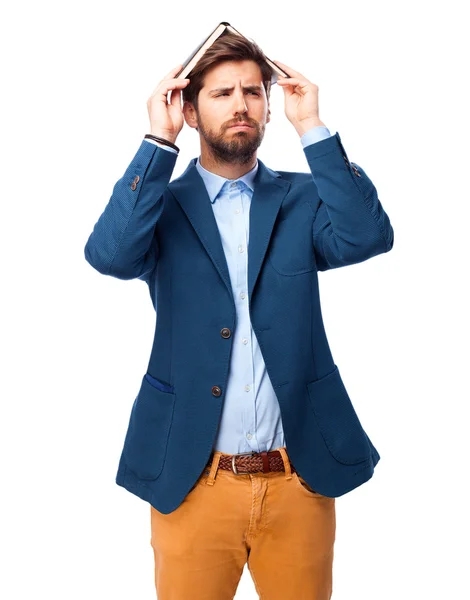 Boring businessman with small book — Stock Photo, Image