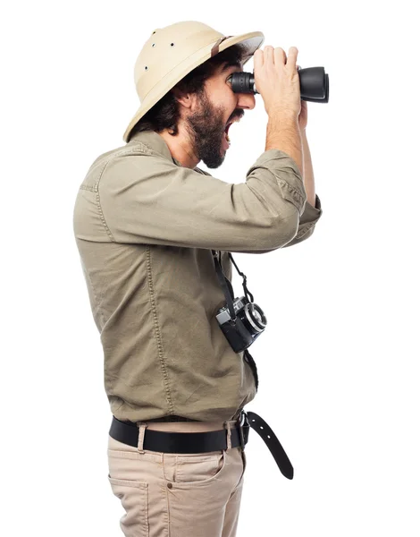 Homem explorador orgulhoso com binóculos — Fotografia de Stock