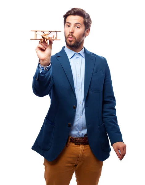 Hombre de negocios feliz con avión — Foto de Stock