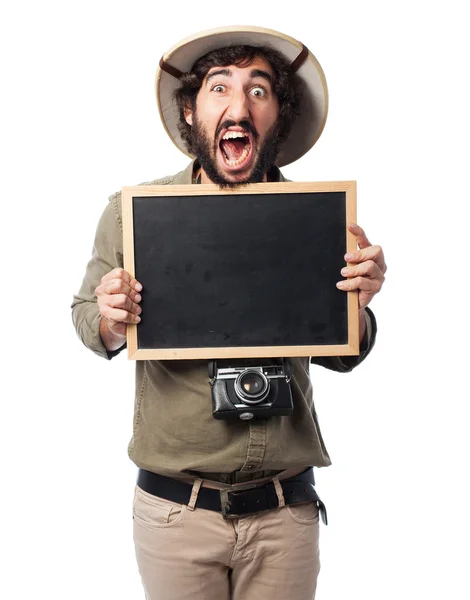 Crazy explorer man with blackboard — Stock Photo, Image